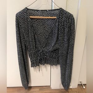 Black polka dot long sleeve top from Zara.